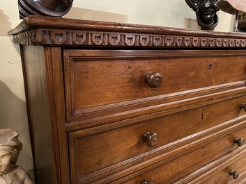 A walnut four-drawer commode, 19th C.