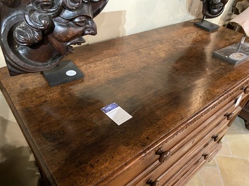 A walnut four-drawer commode, 19th C.