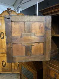 An English Jacobean-style four-door cabinet, 19th C.