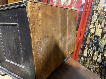 An ebonised and inlaid wooden cabinet, 19th C.