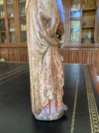 A polychrome wooden figure of Elizabeth of Hungary, late 16th C.