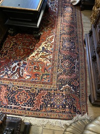 A large rectangular ornamental Heriz rug, 1st half 20th C.