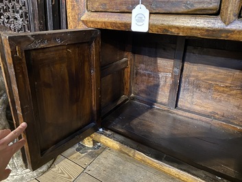 A Chinese elmwood sideboard, 19/20th C.