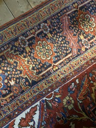 A large rectangular ornamental Heriz rug, 1st half 20th C.