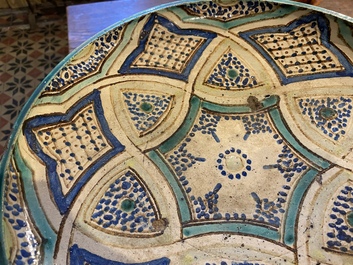 Four Moroccan polychrome 'Fez' pottery dishes, 19/20th C.