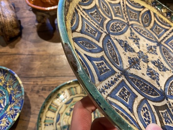 Four Moroccan polychrome 'Fez' pottery dishes, 19/20th C.