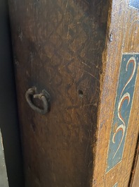 A German polychrome pine single-door cupboard, 18/19th C.