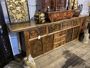 A Chinese elmwood sideboard, 19/20th C.