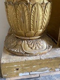 An impressive French Empire-style gilt wooden mirror on faux marble-painted stand, 19th C