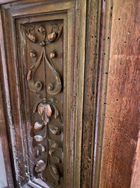 A walnut 'credence' case with portrait medallions, probably France, late 17th C. with later elements