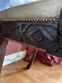 An impressive English partly gilt wooden masonic throne chair with leather upholstery, 19th C.