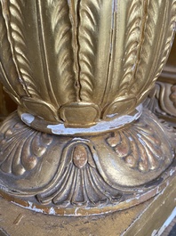 An impressive French Empire-style gilt wooden mirror on faux marble-painted stand, 19th C