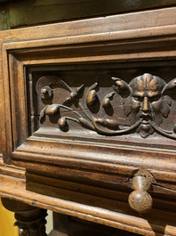 A walnut 'credence' case with portrait medallions, probably France, late 17th C. with later elements