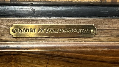 Een paar grote Franse mahoniehouten wandspiegels met ge&euml;boniseerde lijsten en inlegwerk van divers hout, gedat. 1884