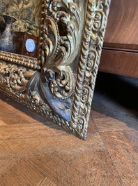 A finely carved gilt wooden mirror, probably Italy, 17/18th C.