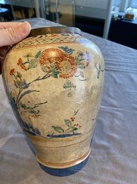 A Japanese Hizen Kakiemon-style vase with copper rim, Edo, 18th C.