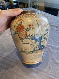 A Japanese Hizen Kakiemon-style vase with copper rim, Edo, 18th C.