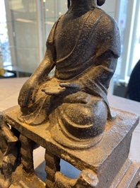 A large Chinese cast iron Buddha, Ming