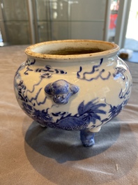 A Chinese blue and white 'mythical beasts' tripod censer, 19th C.