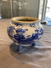 A Chinese blue and white 'mythical beasts' tripod censer, 19th C.