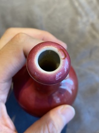 A Chinese monochrome ruby-glazed garlic head bottle vase, Qianlong mark, Republic