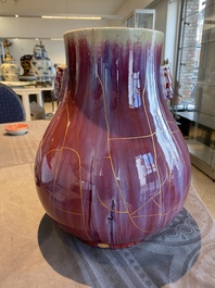 A Chinese flamb&eacute;-glazed hu vase with kintsugi repair, Qianlong mark, 20th C.