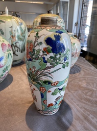 Three Chinese famille rose vases, two famille verte vases and a dish, 19/20th C.