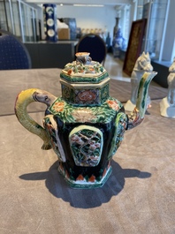 A Chinese verte biscuit reticulated teapot and cover, Kangxi