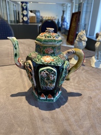 A Chinese verte biscuit reticulated teapot and cover, Kangxi