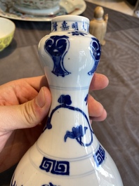 A Chinese blue and white 'dragons' bottle vase, Jiajing mark, 19/20th C.