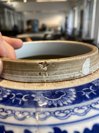 A Chinese blue and white 'lotus scroll' jar, 19th C.