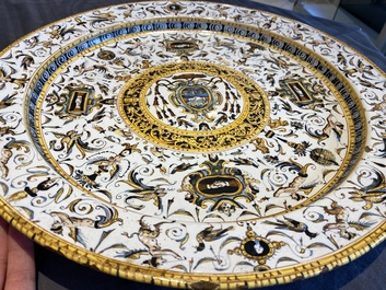 A large Italian maiolica dish with the arms of Cardinal Toschi, Deruta, dated 1609