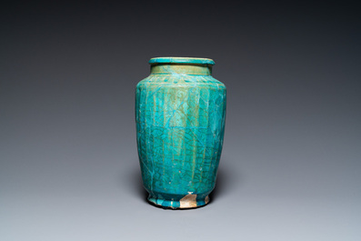 A turquoise-glazed Kashan albarello, Persia, 13th C.
