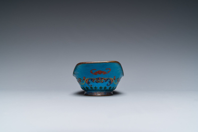A pair of Chinese or Vietnamese enamel cup stands and an ingot-shaped bowl, 18/19th C.