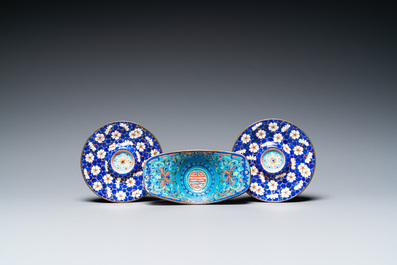 A pair of Chinese or Vietnamese enamel cup stands and an ingot-shaped bowl, 18/19th C.