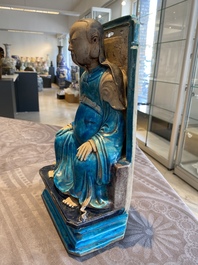 A Chinese fahua-glazed biscuit figure of Zhenwu, Ming