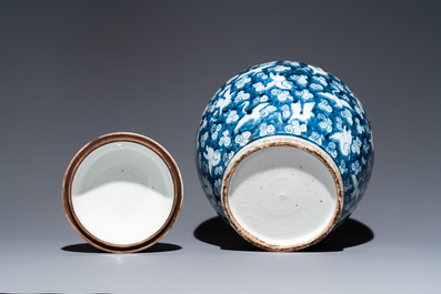 A Chinese blue and white 'cranes' jar and cover, 19/20th C.