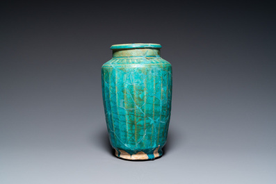 A turquoise-glazed Kashan albarello, Persia, 13th C.