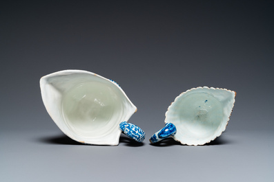 Two blue and white French faience helmet-shaped jugs, Rouen and Nevers, 18th C.