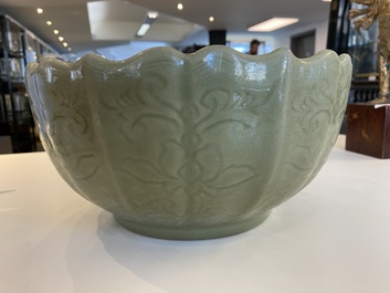 A large Chinese Longquan celadon bowl with underglaze lotus design, Ming