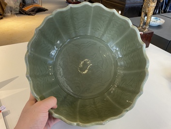 A large Chinese Longquan celadon bowl with underglaze lotus design, Ming