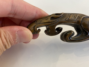 A Chinese bronze 'chilong' scroll weight, probably Qing