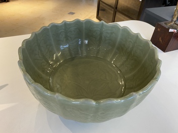 A large Chinese Longquan celadon bowl with underglaze lotus design, Ming