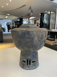 A Japanese or Korean bronze bird-topped censer, probably 17th C.