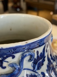 A pair of Chinese famille verte double gourd vases and a blue and white vase and cover, 19/20th C.