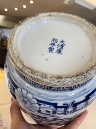 A pair of Chinese blue and white 'phoenix' vases, Kangxi mark, 19th C.