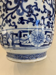 A pair of Chinese blue and white 'phoenix' vases, Kangxi mark, 19th C.