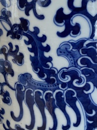 A pair of Chinese blue and white 'phoenix' vases, Kangxi mark, 19th C.