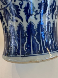 A pair of Chinese famille verte double gourd vases and a blue and white vase and cover, 19/20th C.