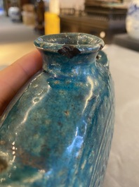 A Chinese fahua 'moonflask' with applied lotus design, Ming